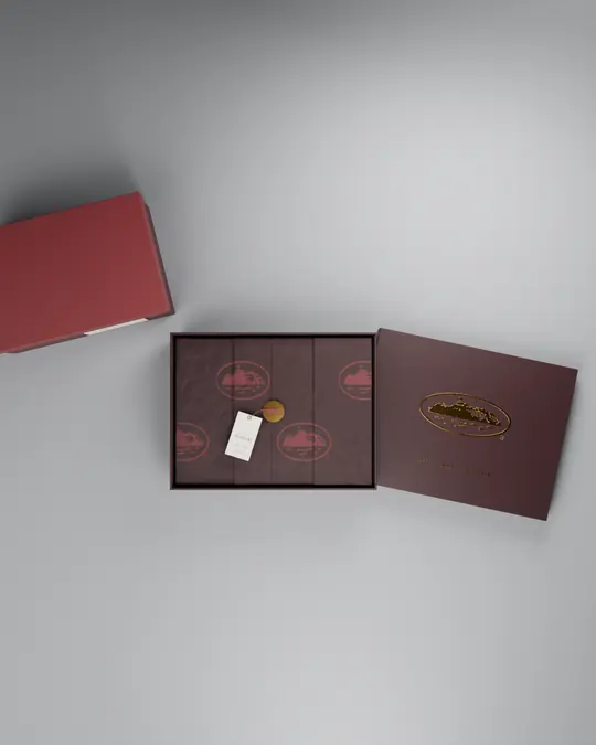 The open box from above with tonal Alcatraz tissue