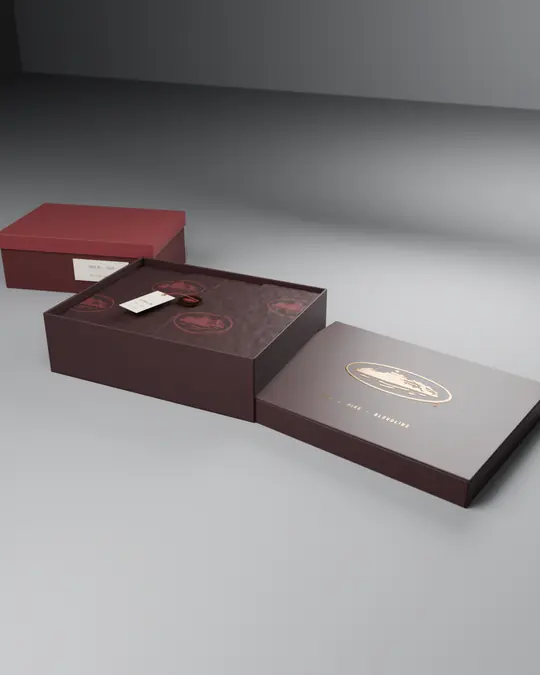 Black cherry rigid box with tissue, brass seal and hangtag