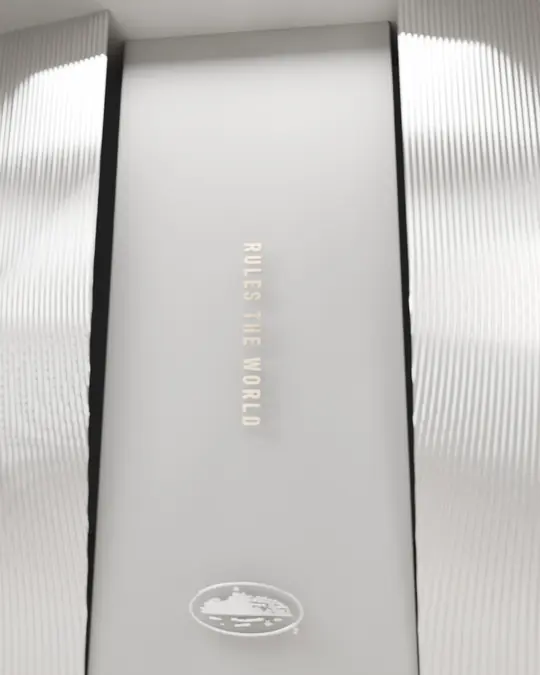 The fluted chrome walls with RULES THE WORLD